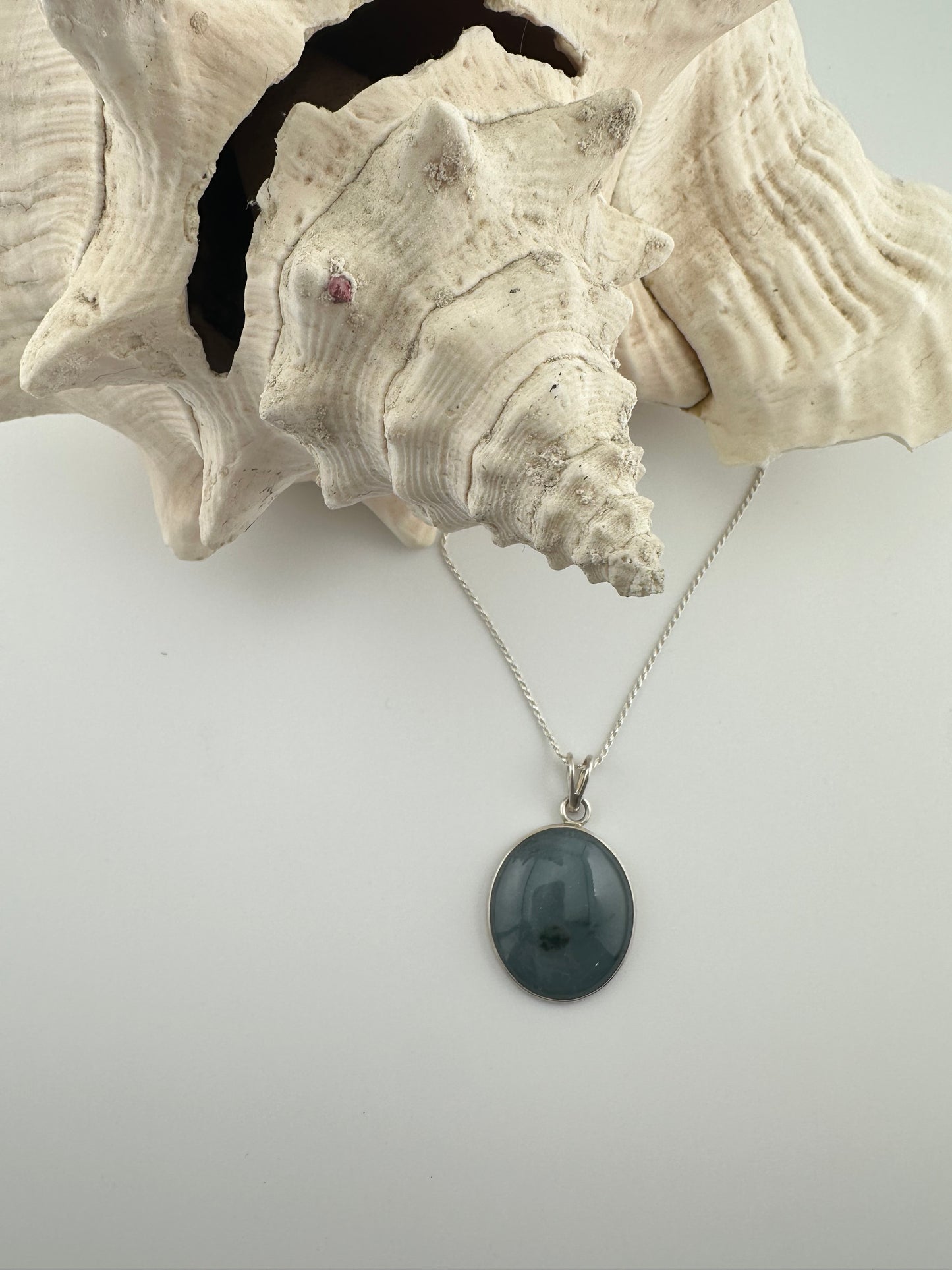 Grayed blue Jade circular pendant