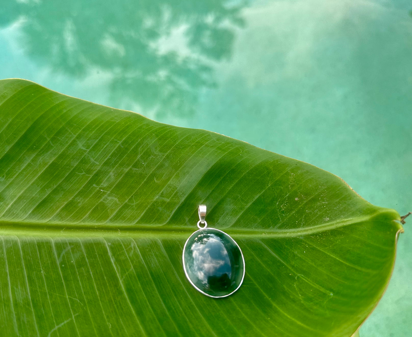 Translucent green Jade circle pendant