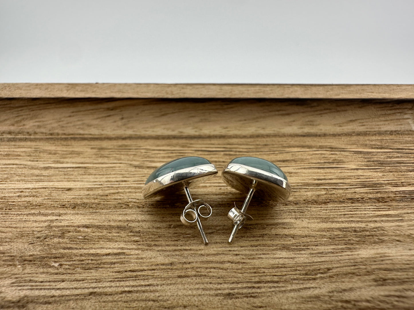 Grayed Jade oval silver stud earrings