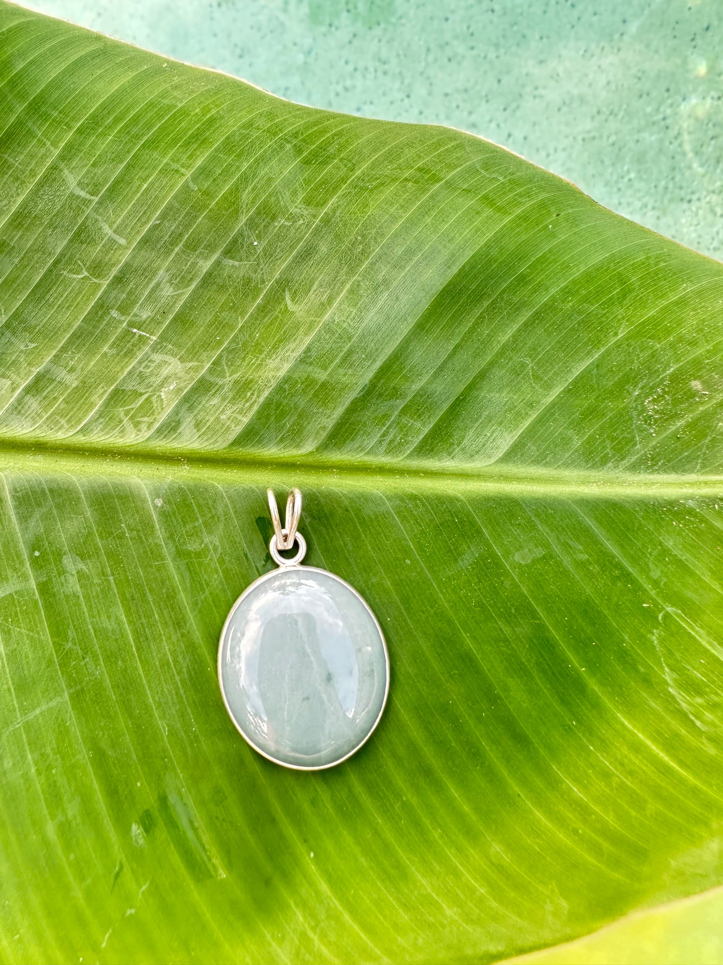 Grayed blue Jade circular pendant