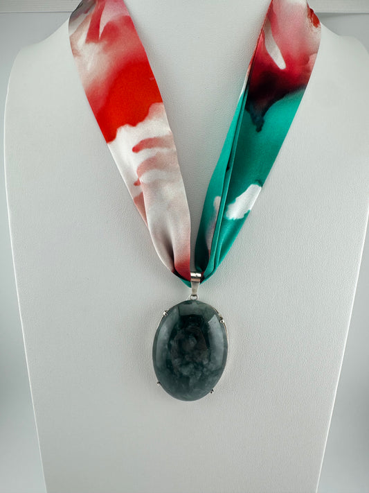 Translucent green oval framed Jade pendant