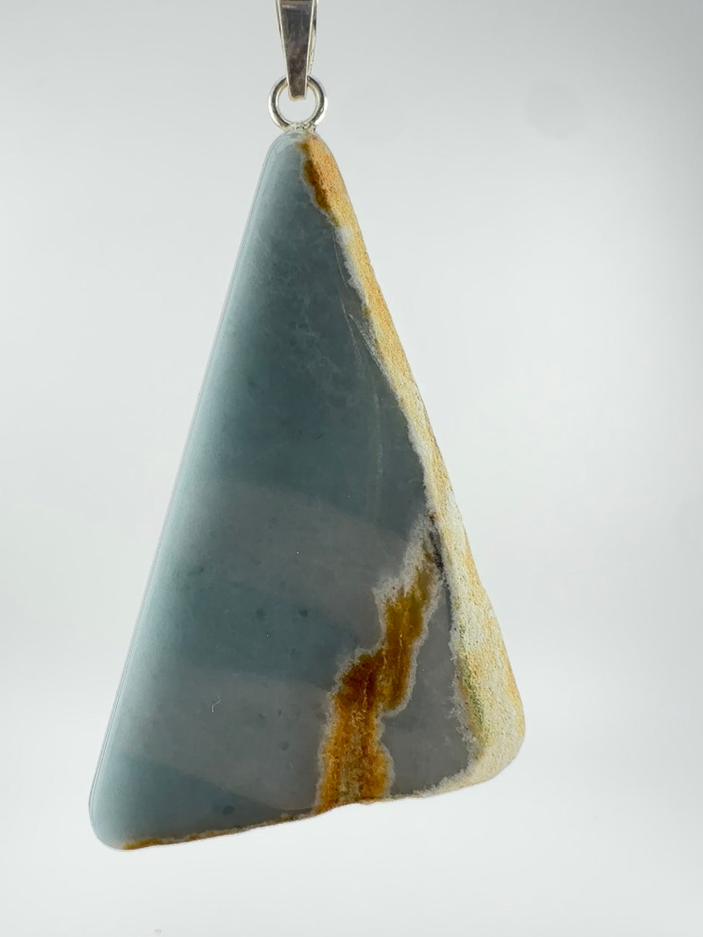 Blue fossilized Jade triangle pendant