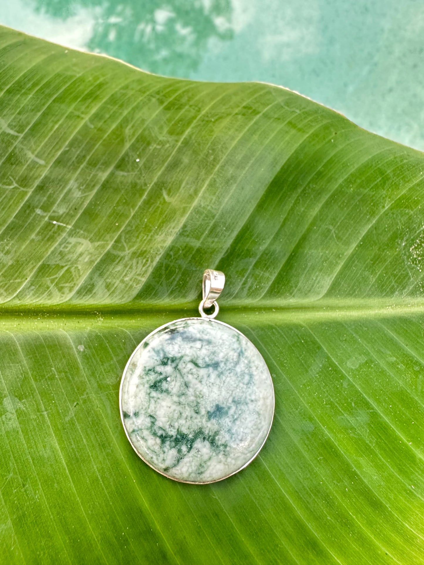 Spotted green jaguar Jade circular pendant